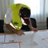 MotoBracia na litewskim torze - udany trening motocyklowy - organizator sprawdza dokumenty