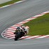 Grand Prix Malezji 2012 motocykle w deszczu - slide w apeksie