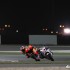 Moto GP Katar 2012 zdjecia z wyscigu - Stoner i Abraham