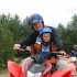Piknik ATV Honda rodzinny weekend na quadach - dziecko z tata na quadzie