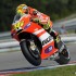 MotoGP w Czechach 2011 - zdjecia z XI rundy - wheelie wyjscie z zakretu ducati