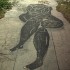 Kozubnik wycieczka do opuszczonego miasta - malowidlo na chodniku