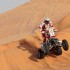 Rafal Sonik na podium Abu Dhabi Desert Challenge - wheelie