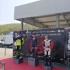Zwycieski debiut motocykla Aprilia RS 660 nalezacego do Gabro Racing Team startujacego w pierwszej rundzie MES Motoestate - zawodnicy na podium