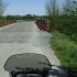 Trasa motocyklowa przez Kampinos i wzdluz rzeki Wkry TPM 6 - 18 Za mostem widac wieze kosciola w Sochocinie