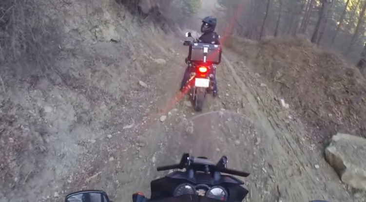 Suzuki V Strom muddy downhill