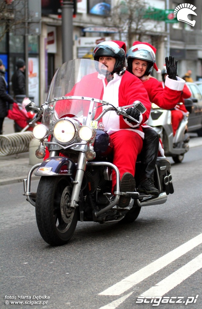 Mikolaj ze sniezynka na motocyklu